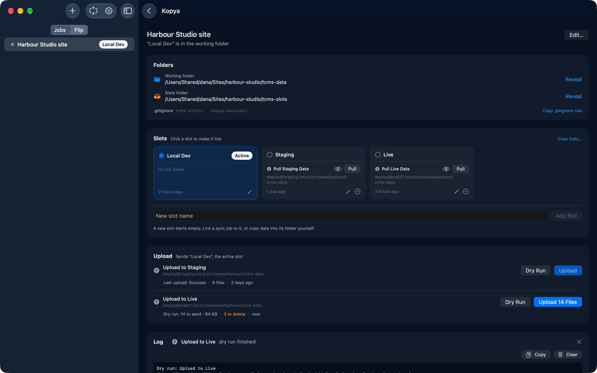 Kopya's Flip pane for a website, with Local Dev, Staging and Live slots, an upload card and the run log.